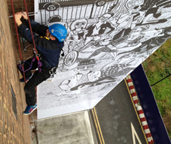 Banner wraps and signage abseiling